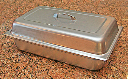Photo of steam table tray & cover.